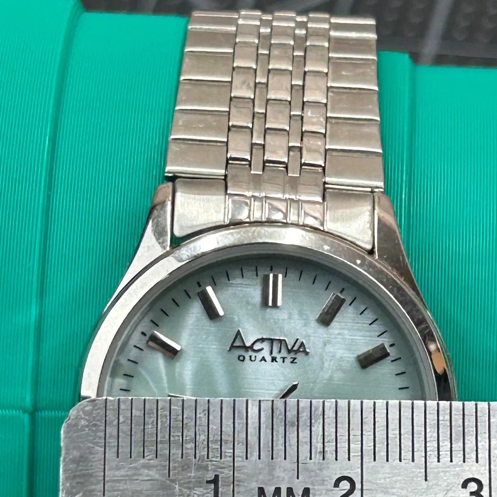 Activa Quartz Watch Silver Tone‎ Blue Mother of Pearl Dial Stainless Steel